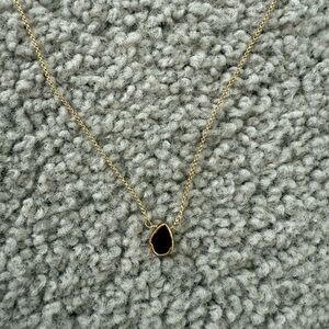 Elegant Gold and Garnet Pendant Necklace